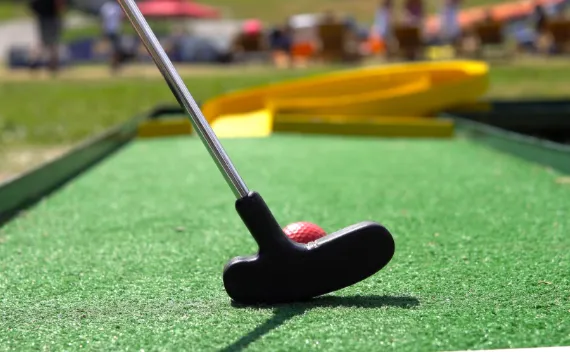Putting green and golf club